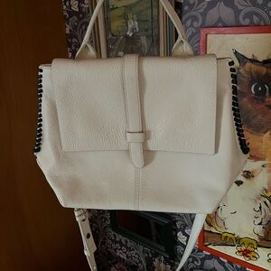 Badgley Mischka cream mid sized fine leather bag